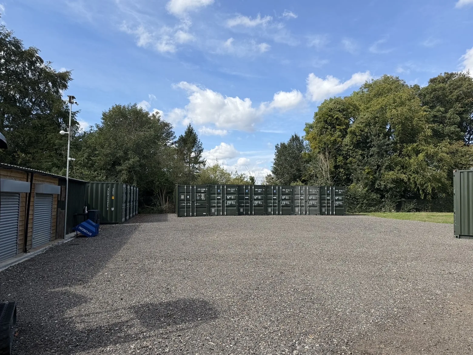 Wide blue-sky view across the Morris Safe Storage Solutions site